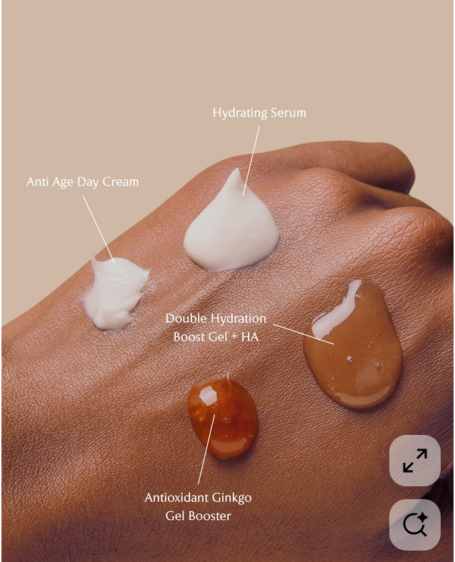 Four skincare textures — cream, serum, and gel boosters — swatched on the back of a hand